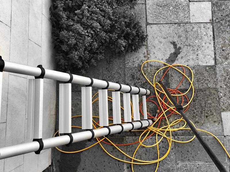 Window cleaning ladder and hose reels ready to go